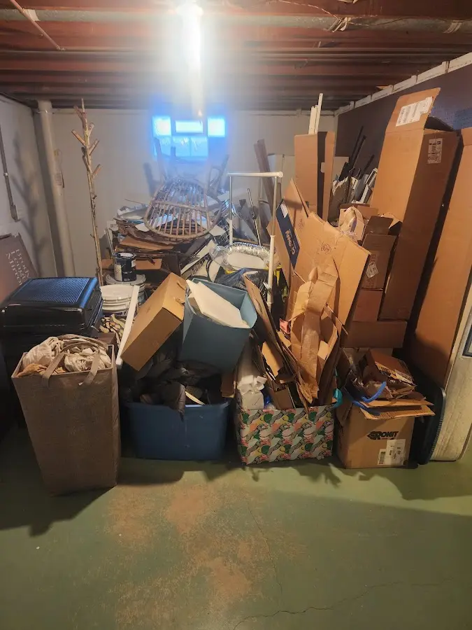 Roll-off dumpster container at job site for 2 Yard Dumpster Rental in Sheffield